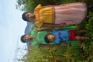 Host "sisters" and host "nephew" harvesting rice
